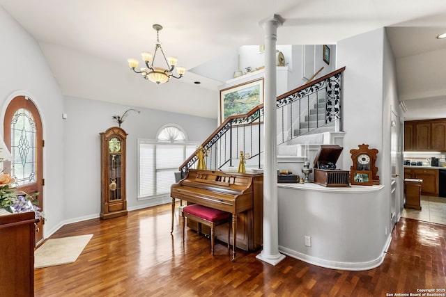 1434 Whispering Water, Spring Branch, TX 78070 - entrance foyer featuring lofted ceiling, wood finished floors, a chandelier, stairs, and baseboards
