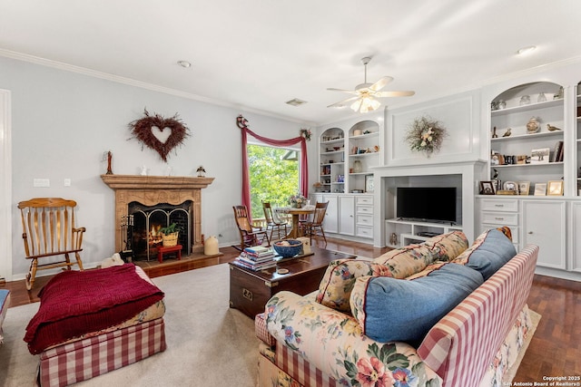 1434 Whispering Water, Spring Branch, TX 78070 - living room with a high end fireplace, crown molding, ceiling fan, built in features, and wood finished floors