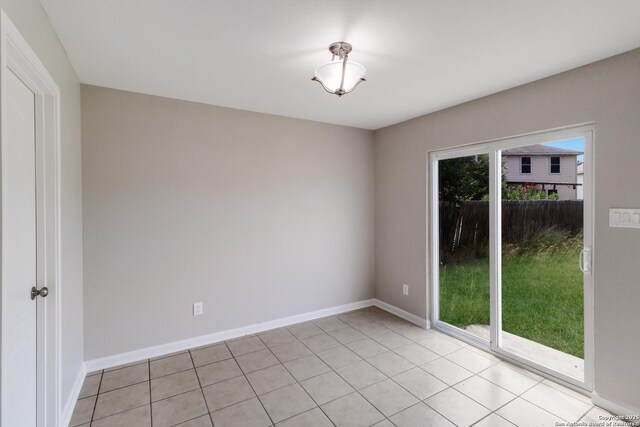 9618 Copper Fls, San Antonio, TX 78109 - empty room featuring baseboards and light tile patterned flooring