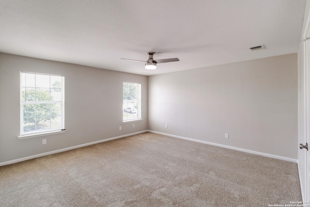 9618 Copper Fls, San Antonio, TX 78109 - carpeted spare room featuring plenty of natural light, ceiling fan, and baseboards