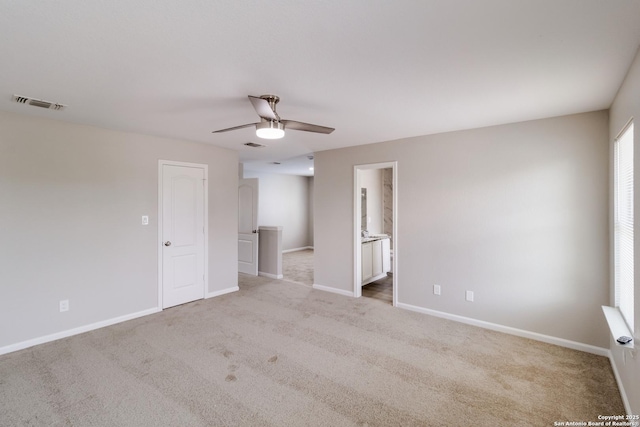 9618 Copper Fls, San Antonio, TX 78109 - carpeted spare room featuring ceiling fan and baseboards