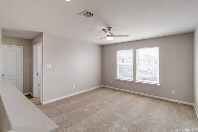 9618 Copper Fls, San Antonio, TX 78109 - unfurnished room featuring carpet floors, baseboards, and ceiling fan