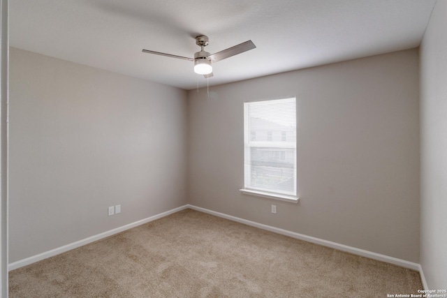 9618 Copper Fls, San Antonio, TX 78109 - empty room featuring carpet flooring, a ceiling fan, and baseboards