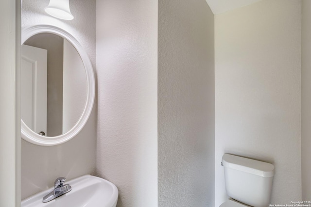 9618 Copper Fls, San Antonio, TX 78109 - bathroom with a sink and toilet