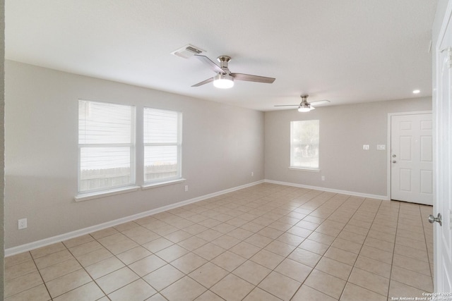 9618 Copper Fls, San Antonio, TX 78109 - spare room featuring ceiling fan, light tile patterned flooring, and baseboards