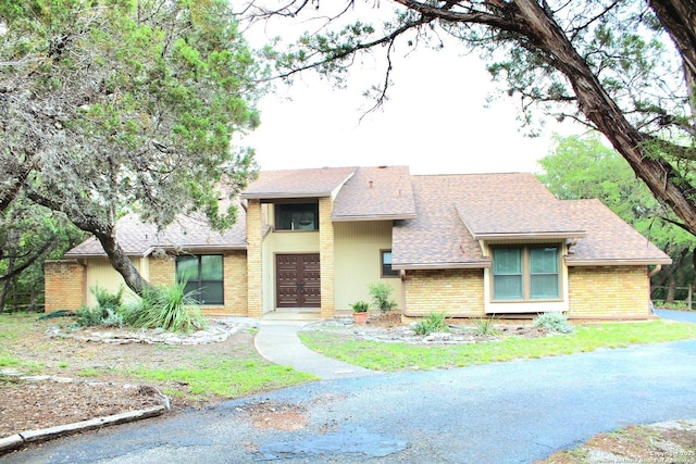 9118 Fox Briar, Boerne, TX 78006 - mid-century inspired home with brick siding and roof with shingles