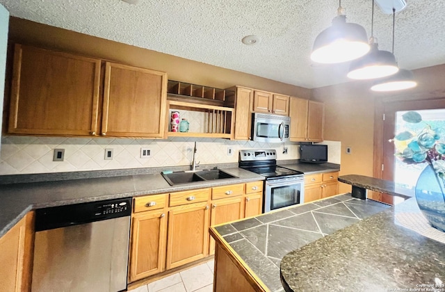 9208 Bowen, San Antonio, TX 78250 - kitchen with stainless steel appliances, a sink, a textured ceiling, backsplash, and open shelves