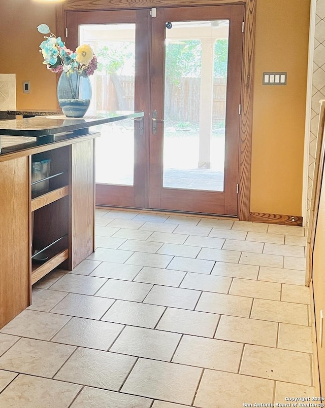 9208 Bowen, San Antonio, TX 78250 - doorway to outside featuring healthy amount of natural light and french doors
