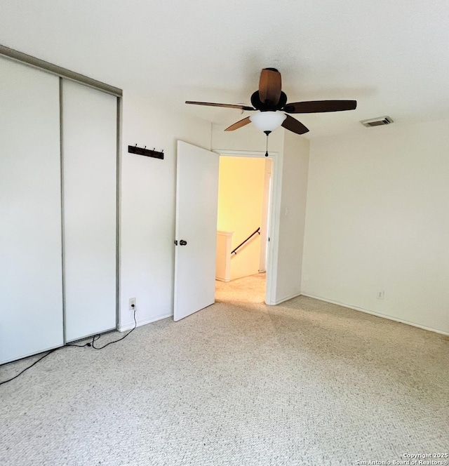 9208 Bowen, San Antonio, TX 78250 - unfurnished bedroom with a closet and a ceiling fan