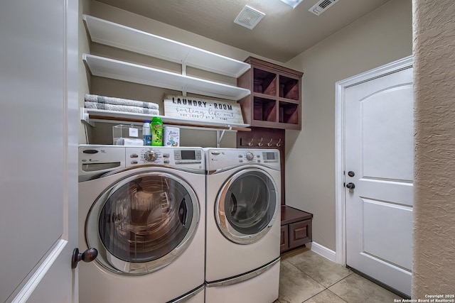 3811 Mira Mesa, San Antonio, TX 78259 - laundry area featuring washer and clothes dryer and light tile patterned floors