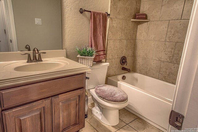 3811 Mira Mesa, San Antonio, TX 78259 - full bath featuring vanity, toilet, washtub / shower combination, tile patterned flooring, and a textured wall