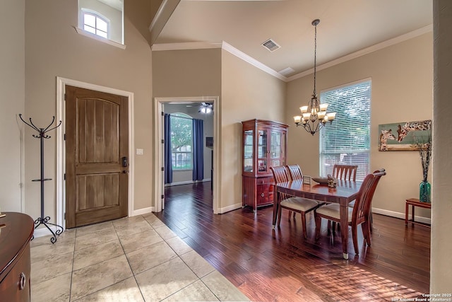 3811 Mira Mesa, San Antonio, TX 78259 - entryway with a towering ceiling, a chandelier, baseboards, ornamental molding, and light wood-type flooring