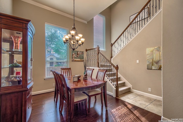 3811 Mira Mesa, San Antonio, TX 78259 - dining area featuring ornamental molding, a chandelier, stairs, baseboards, and dark wood-style floors