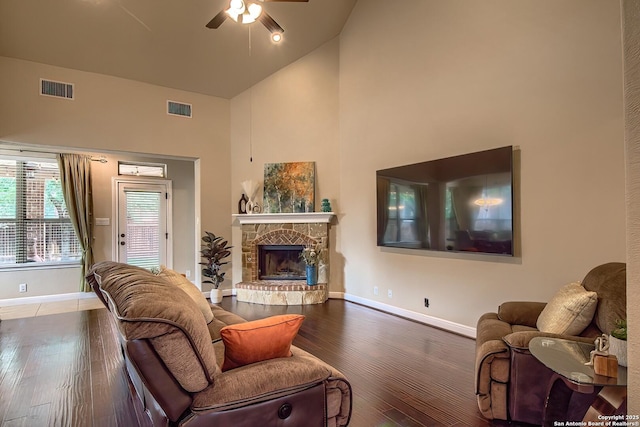3811 Mira Mesa, San Antonio, TX 78259 - living room with high vaulted ceiling, baseboards, ceiling fan, wood finished floors, and a fireplace
