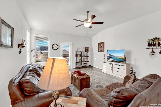 11706 Troubadour Trl, San Antonio, TX 78245 - living room with wood finished floors, ceiling fan, lofted ceiling, and baseboards