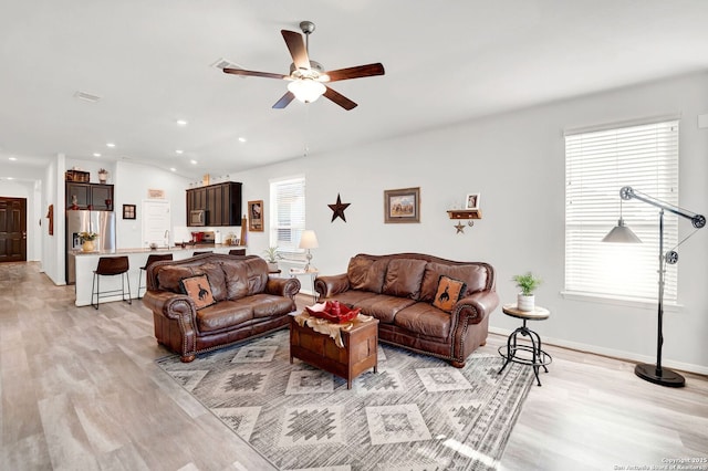 11706 Troubadour Trl, San Antonio, TX 78245 - living area with light wood-type flooring, ceiling fan, recessed lighting, and baseboards