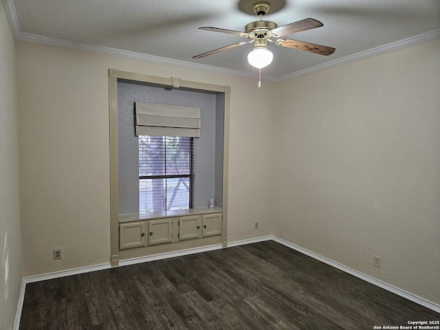 3524 Angora Trl, Schertz, TX 78154 - spare room with dark wood-style flooring, a ceiling fan, crown molding, and baseboards