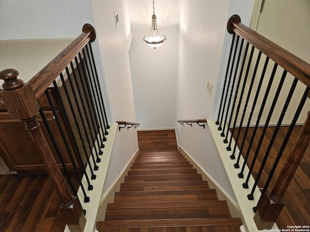 3524 Angora Trl, Schertz, TX 78154 - staircase with wood finished floors and baseboards
