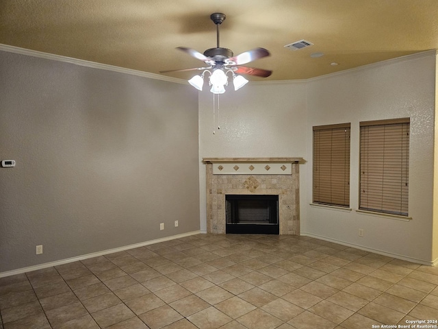 3524 Angora Trl, Schertz, TX 78154 - unfurnished living room with a ceiling fan, crown molding, light tile patterned flooring, and a fireplace