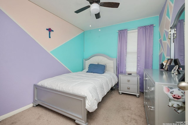 6631 Rosenthal Pass, San Antonio, TX 78252 - carpeted bedroom with baseboards and ceiling fan