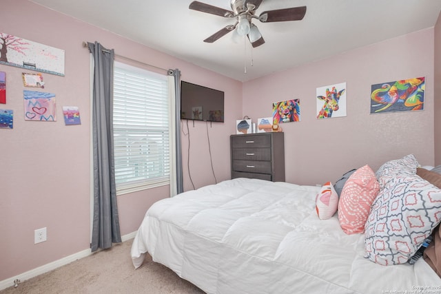 6631 Rosenthal Pass, San Antonio, TX 78252 - carpeted bedroom with baseboards and a ceiling fan