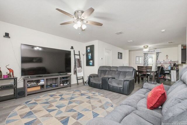 6631 Rosenthal Pass, San Antonio, TX 78252 - living room featuring ceiling fan and wood finished floors