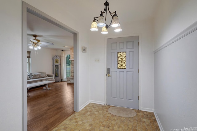 109 Briarwood, Kerrville, TX 78028 - entrance foyer with baseboards, ceiling fan, a chandelier, and light wood-style floors