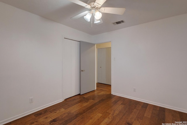 109 Briarwood, Kerrville, TX 78028 - unfurnished bedroom featuring wood finished floors, baseboards, a ceiling fan, and a closet