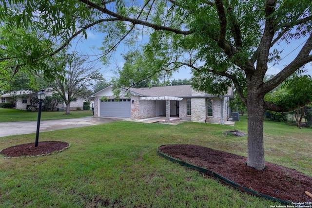 109 Briarwood, Kerrville, TX 78028 - view of front facade with a garage, driveway, a front yard, and brick siding
