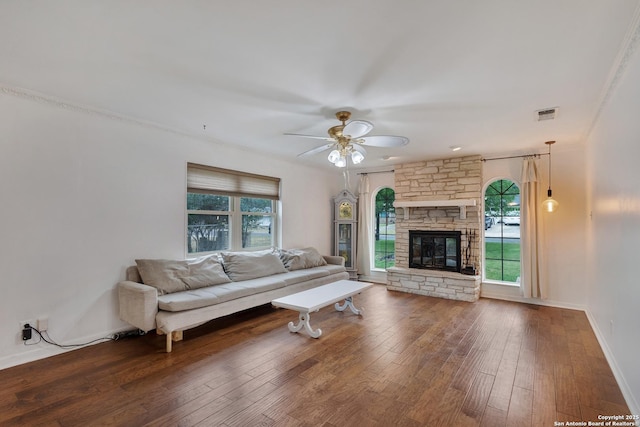 109 Briarwood, Kerrville, TX 78028 - living room featuring hardwood / wood-style flooring, a ceiling fan, baseboards, and a fireplace