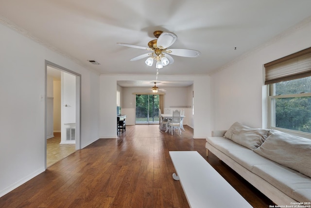 109 Briarwood, Kerrville, TX 78028 - living area with a ceiling fan, hardwood / wood-style floors, ornamental molding, and baseboards