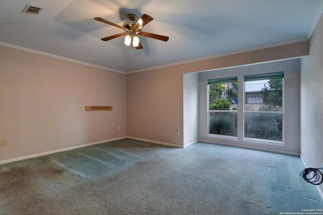 1306 Lytle, Kerrville, TX 78028 - unfurnished room featuring carpet, ornamental molding, ceiling fan, baseboards, and lofted ceiling