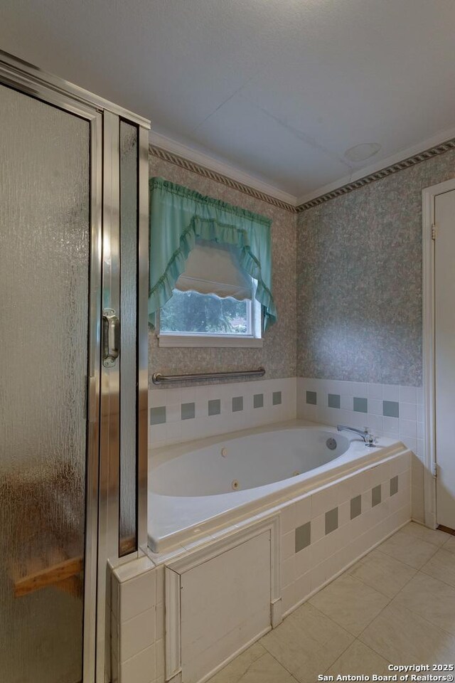 1306 Lytle, Kerrville, TX 78028 - full bath with a shower stall, a jetted tub, and tile patterned flooring