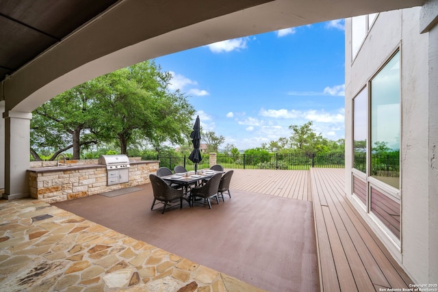 19223 Terra Rock, San Antonio, TX 78255 - view of patio featuring outdoor dining area and a sink