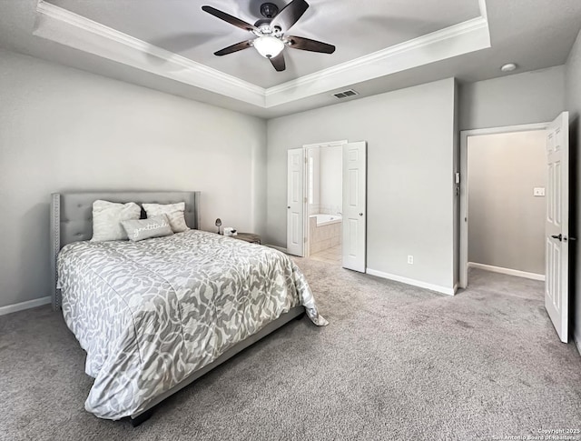 106 Serenity, Boerne, TX 78006 - carpeted bedroom featuring a tray ceiling, crown molding, baseboards, and ensuite bathroom