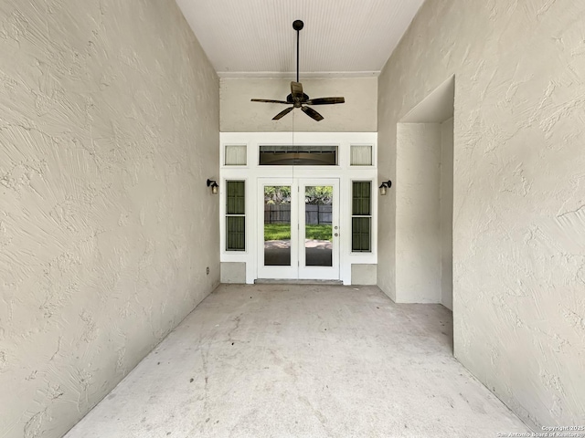 106 Serenity, Boerne, TX 78006 - property entrance with french doors, stucco siding, and a ceiling fan