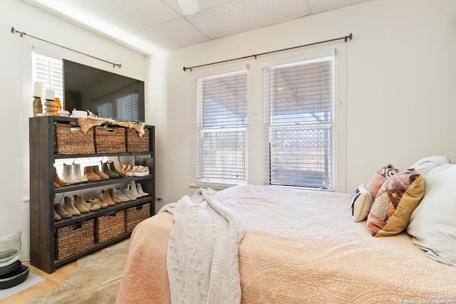 859 Pine St, New Braunfels, TX 78130 - bedroom with wood finished floors and a paneled ceiling