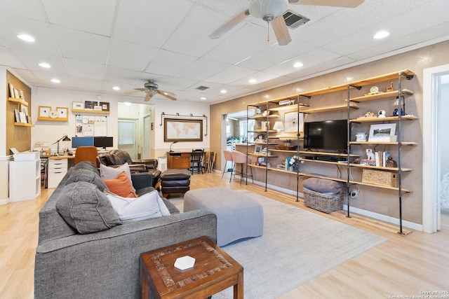 859 Pine St, New Braunfels, TX 78130 - living room with ceiling fan, wood finished floors, a paneled ceiling, baseboards, and recessed lighting