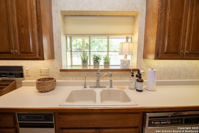8333 Triple Crown, Boerne, TX 78015 - kitchen with a sink, dishwasher, and light countertops