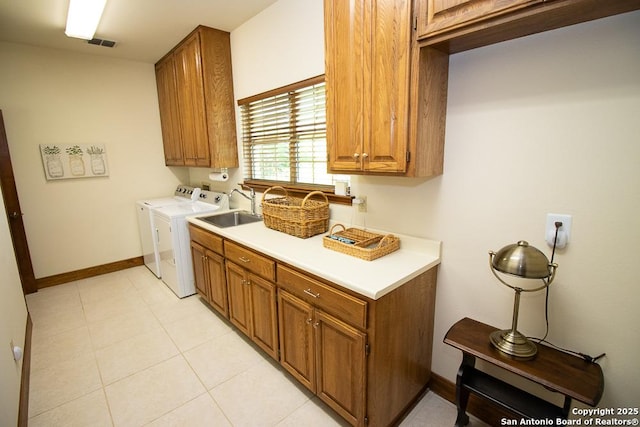 8333 Triple Crown, Boerne, TX 78015 - laundry area with cabinet space, independent washer and dryer, and baseboards