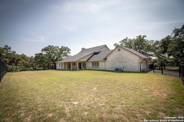 8333 Triple Crown, Boerne, TX 78015 - view of front of house featuring cooling unit, stone siding, and a chimney