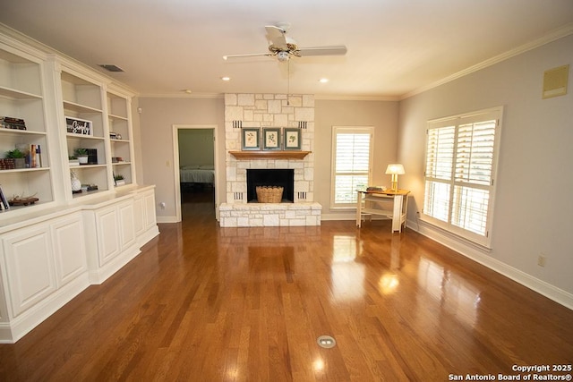8333 Triple Crown, Boerne, TX 78015 - unfurnished living room with ceiling fan, crown molding, a fireplace, baseboards, and wood finished floors