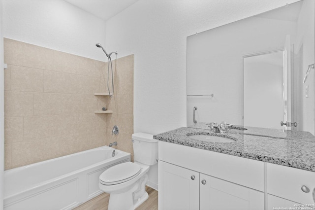 9063 Rancher, Seguin, TX 78155 - full bath featuring wood finished floors, toilet, vanity, and shower / bathtub combination