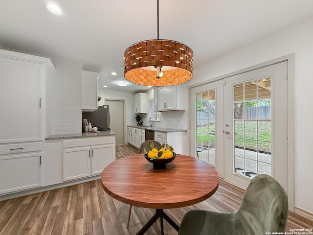 4015 Ramsgate, San Antonio, TX 78230 - dining area with light wood-type flooring, french doors, and recessed lighting