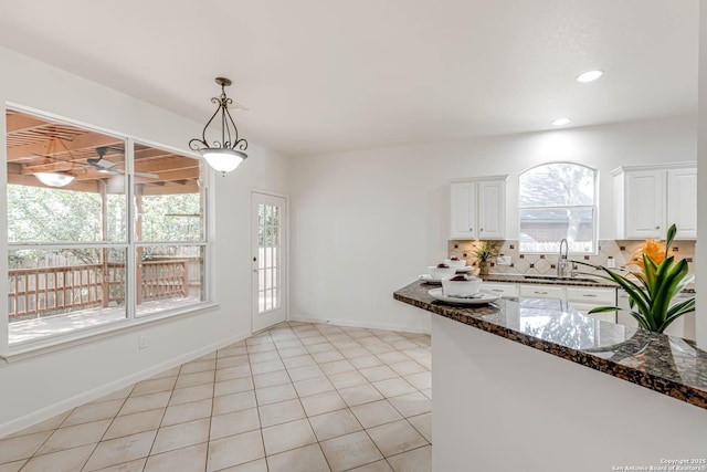 21746 Luisa, San Antonio, TX 78259 - kitchen featuring a sink, healthy amount of natural light, white cabinetry, pendant lighting, and recessed lighting