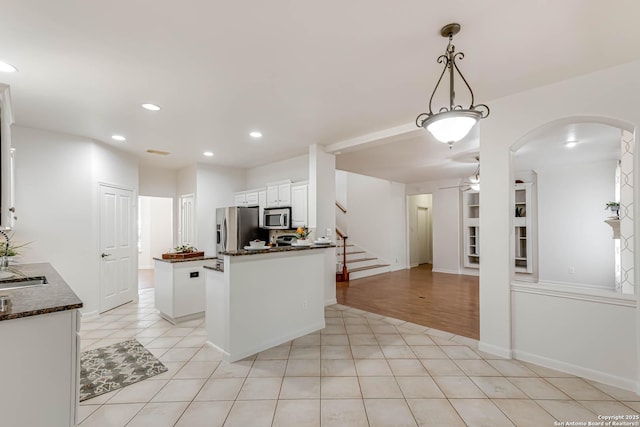21746 Luisa, San Antonio, TX 78259 - kitchen featuring stainless steel appliances, recessed lighting, white cabinetry, ceiling fan, and decorative light fixtures