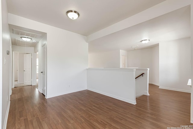 21746 Luisa, San Antonio, TX 78259 - spare room with attic access, wood finished floors, and baseboards