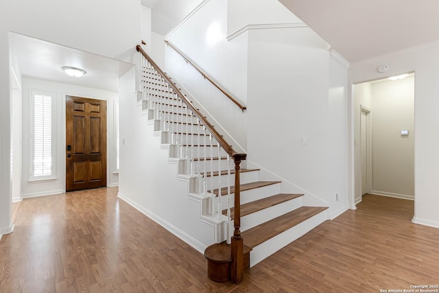 21746 Luisa, San Antonio, TX 78259 - entryway featuring stairs, wood finished floors, and baseboards