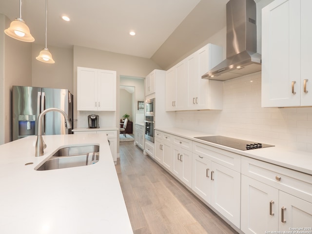 1006 Rock Shelter, San Antonio, TX 78260 - kitchen featuring wall chimney range hood, appliances with stainless steel finishes, a sink, white cabinets, and tasteful backsplash