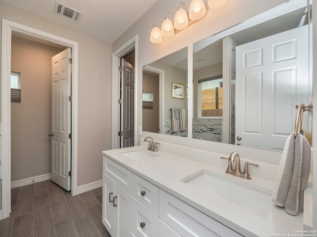 1006 Rock Shelter, San Antonio, TX 78260 - full bathroom with baseboards and double vanity